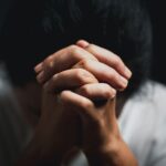 Christianity religion concept. Christian life crisis prayer to god. Woman pray for god blessing to wishing have better life.Woman hand worship to god. Begging for forgiveness and believe in goodness.