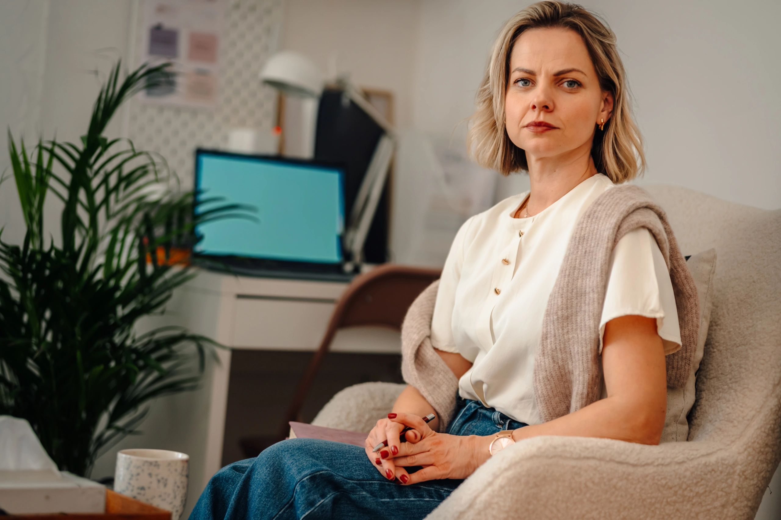 Therapist in an office ready to support a client